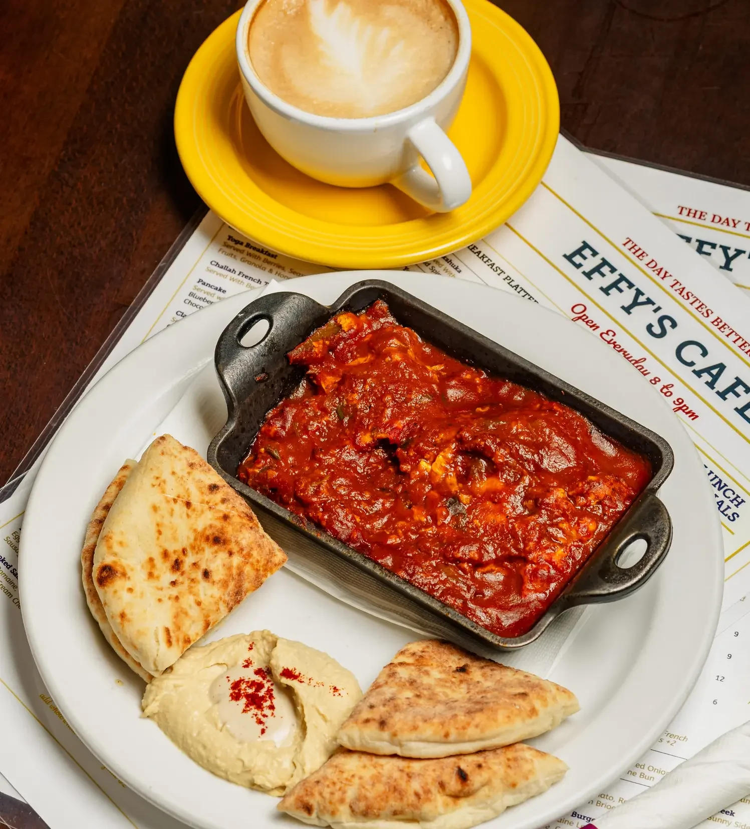 Shakshuka with hummus, pita, and coffee at Effy’s Café