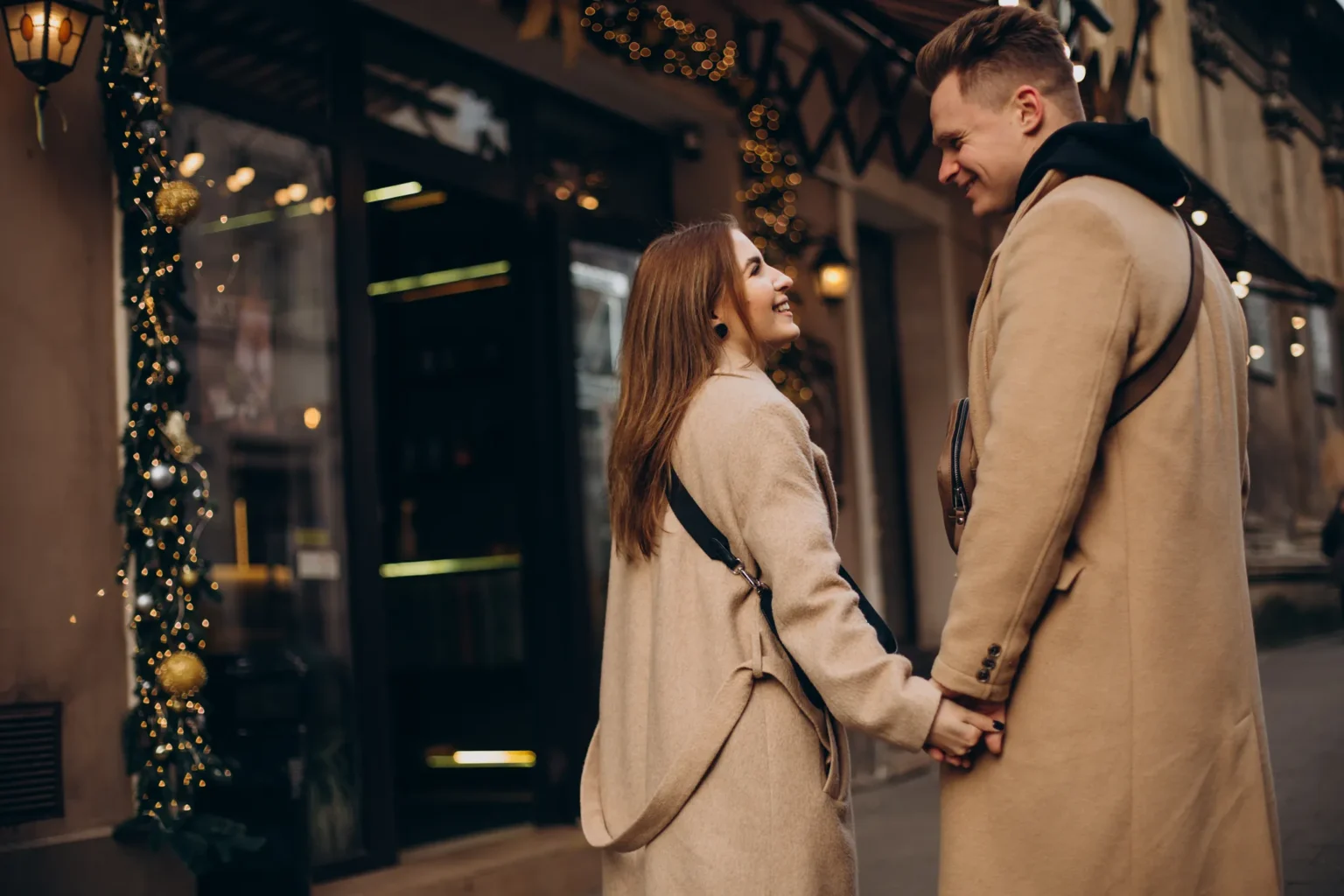 Couple walking together on an Upper West Side street in winter